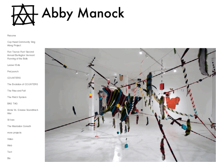 www.abbymanock.com