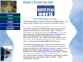 whitefangmotel.com