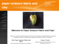 paperscissorsfabriclay.com