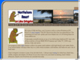 lakelivingstoncottages.com
