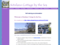 kitsilanocottagebythesea.com