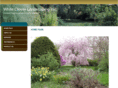 whitecloverlandscaping.com