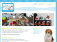 asingingdogboutique.com