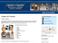trophiestopeka.com