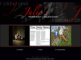 juliesportraitcreations.com