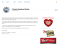 chucksseafoodgrotto.com