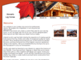 stinnettloghomes.com