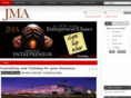johnmusgroveandassociates.com