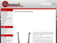 tommysguitarshop.com