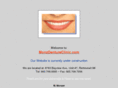 monzdentureclinic.com