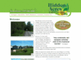 hiddenacrescottages.com