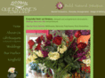 queenannesflowershop.com