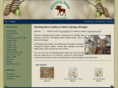 whistlingmoosegallery.com