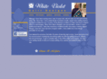 whitevioletquiltdesigns.com