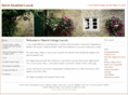 thatchcottagelacock.com