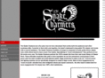 thesnakecharmersband.com
