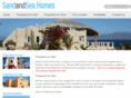 sandandseahomes.com